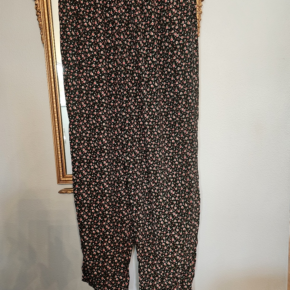 Black pants red floral print